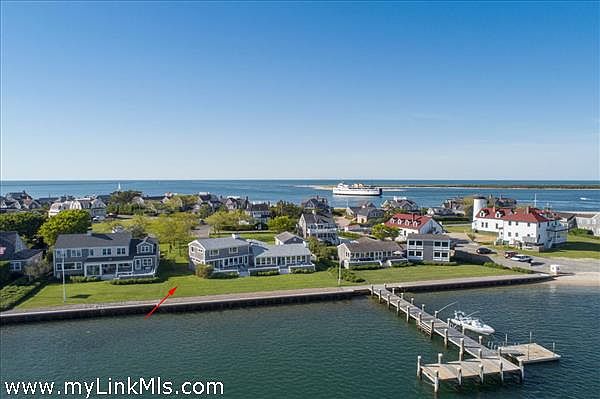 Large main house, two car garage and private dock