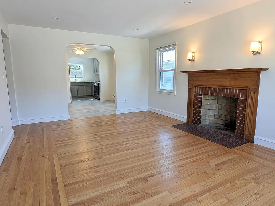 GREAT OPEN CONCEPT LIGHT FILLED W/ CHARMING FIREPLACE DETAIL