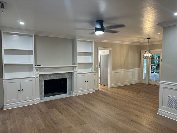 Family room with real fireplace/chimney.
