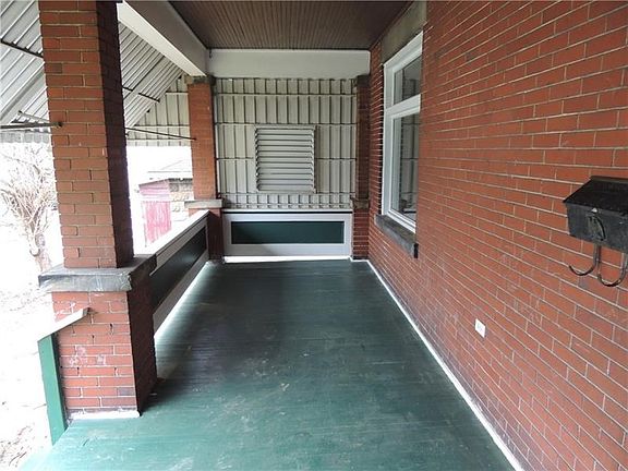 Spacious Front Porch awaiting your furniture