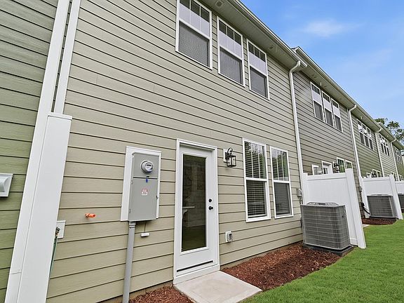 Highly desirable rear exterior with refined craftsmanship in a reputable neighborhood in Arden, NC