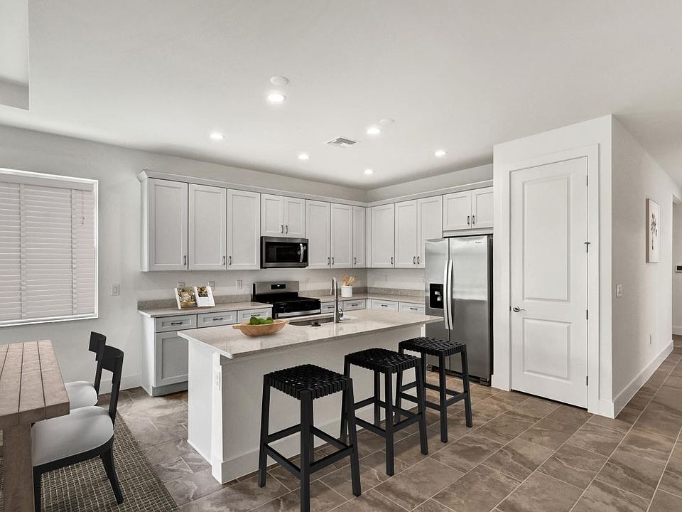 Spacious gourmet kitchen with ample cabinet and counter space
