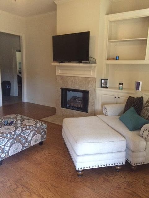 Family room w/fp & built in shelves