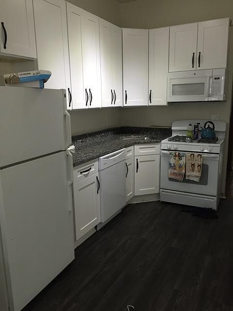 New kitchen with 48" cabinets and pantry in kitchen. Granite countertops, over the range microwave built in.