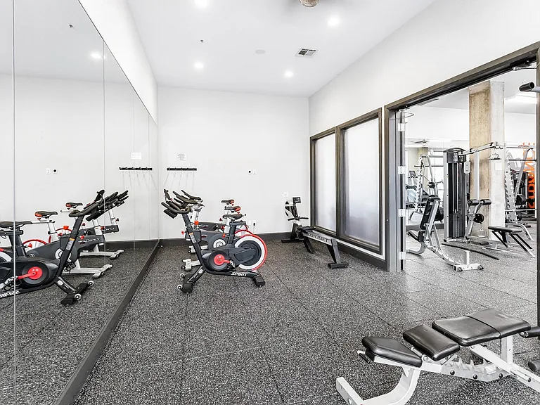 The fitness center includes Peloton bikes