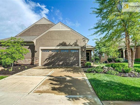 Front of home, beautiful landscaping and curb appeal.