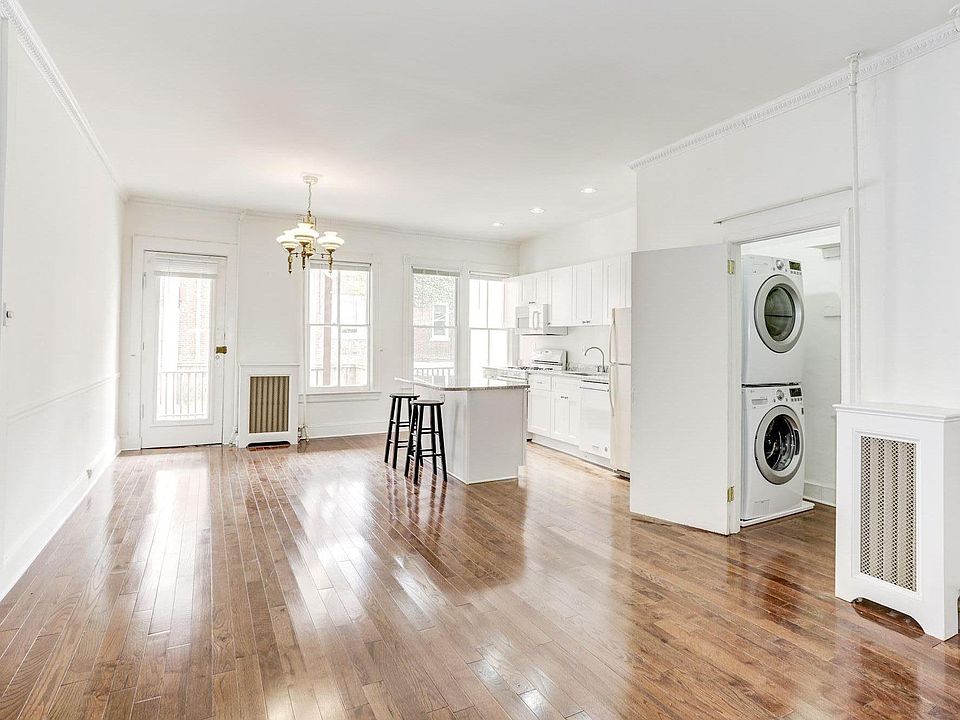 View from living/ dining area. Just painted last week, new hard wood floors, new appliances, new granite counters, new cabinets.