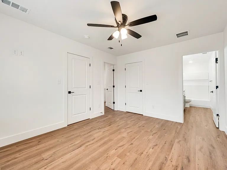 Primary bedroom has two closets.