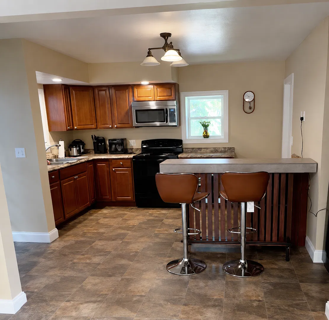 Renovated 3BR Watertown Home | 1.5 Baths, Deck & Parking — Photo 1