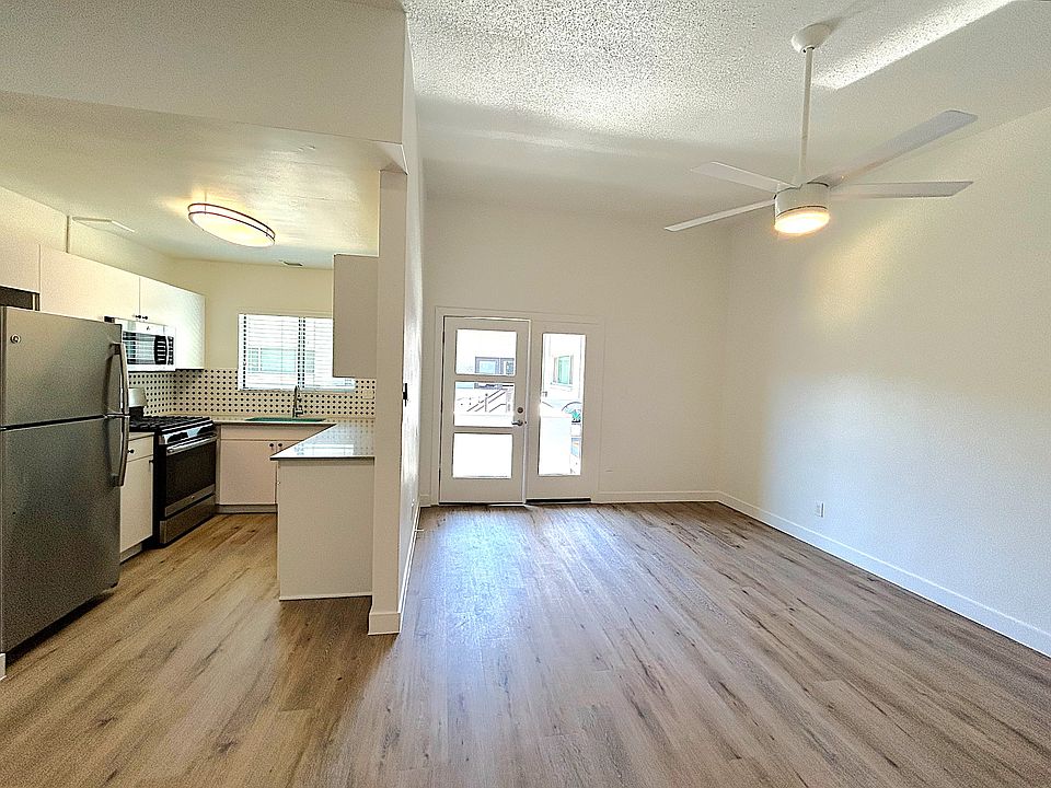 New flooring is featured in our 3 bedroom with dining open to kitchen and living space