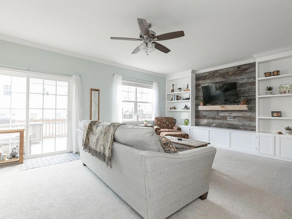 Main Floor Living Room. Beautiful Built-ins. Walk out onto the large deck.