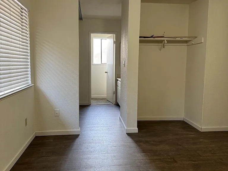 Master Bedroom with En Suite Bathroom, dual sinks and 2 large closets with Beautiful Pergo Flooring.