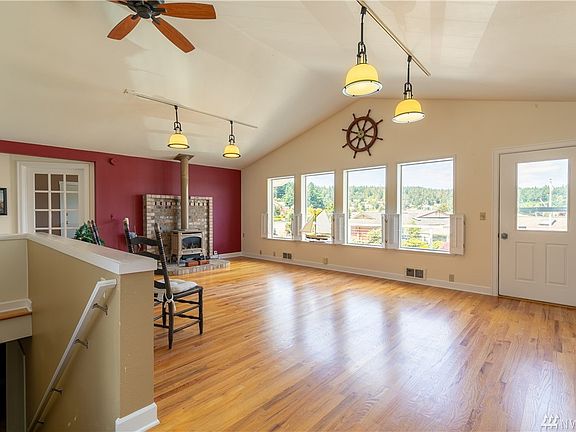 What a delightful kitchen. Lots of counter space, light and bright too. Check out the storage. 