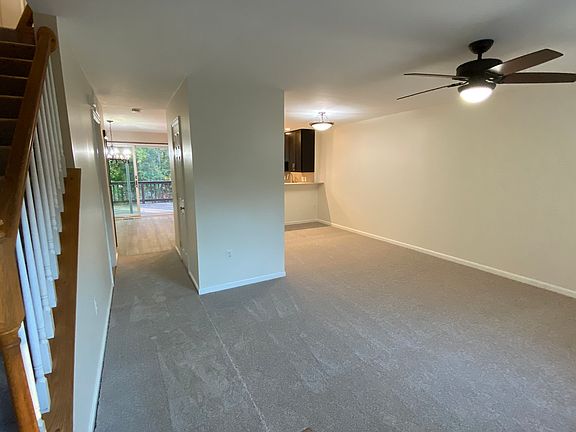 Living room looking into dining room deck and kitchen
