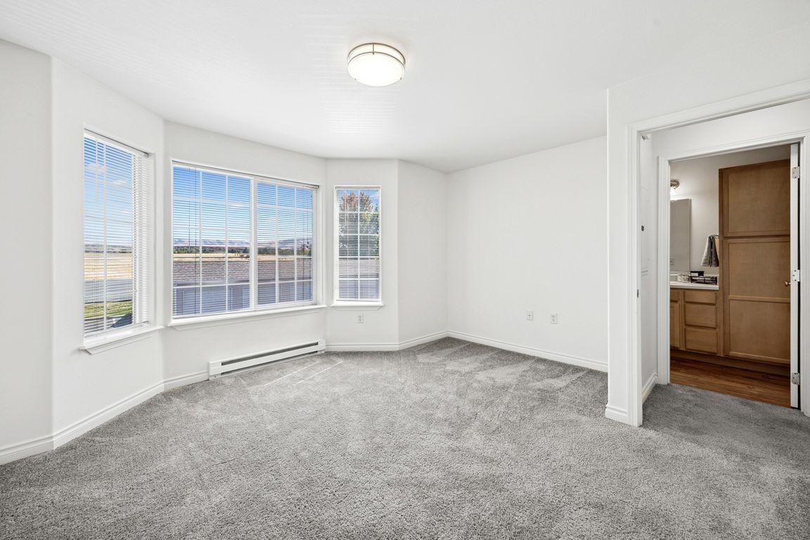 Lion's Gate Apartments in Walla Walla, Washington One Bedroom Bedroom with Large Windows