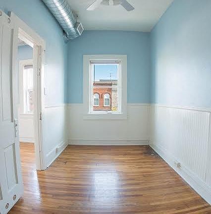 The smaller bedroom can also serve as a small office or walk