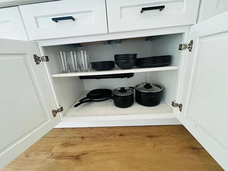 Dinnerware, pots and pans.