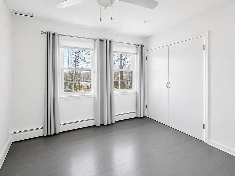 4th bedroom on the main floor, virtually enhanced