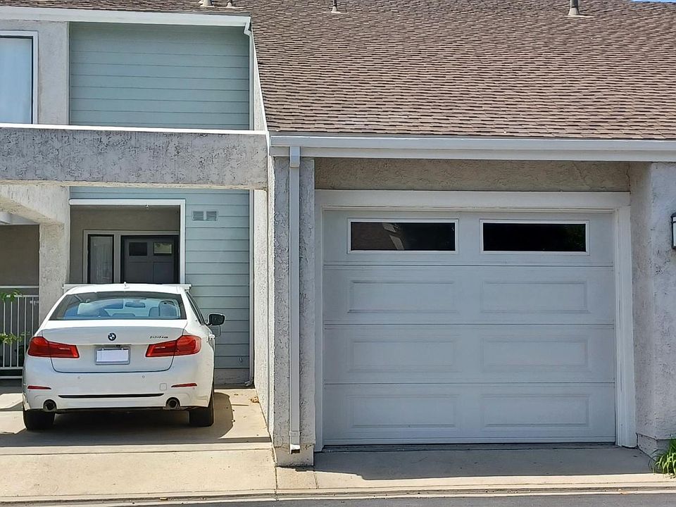 Front of 355 Deerfield. Garage and own carport.