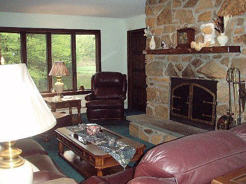 Living Room w/stone fireplace w/deep slate hearth