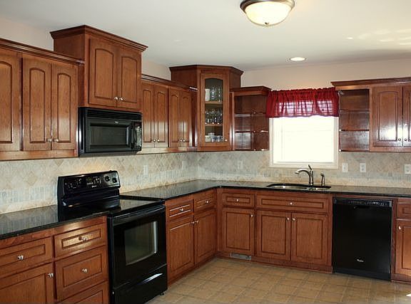 One of the largest kitchens I've ever seen!  Granite countertops