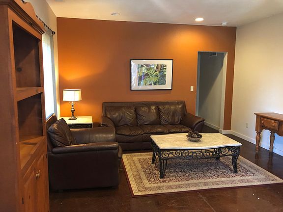 Living room with t.v. if desired, next to kitchen.