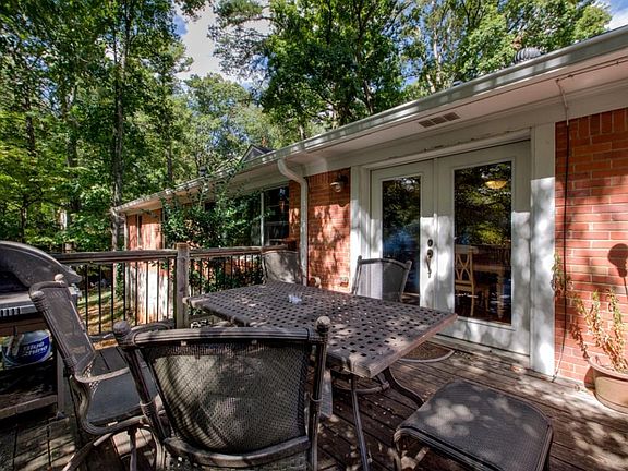 Double doors from dining room lead to deck