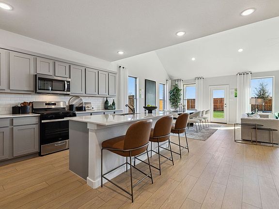 Kitchen in the Winters home plan by Trophy Signature Homes - REPRESENTATIVE PHOTO