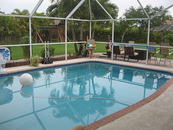 Pool from back covered Patio