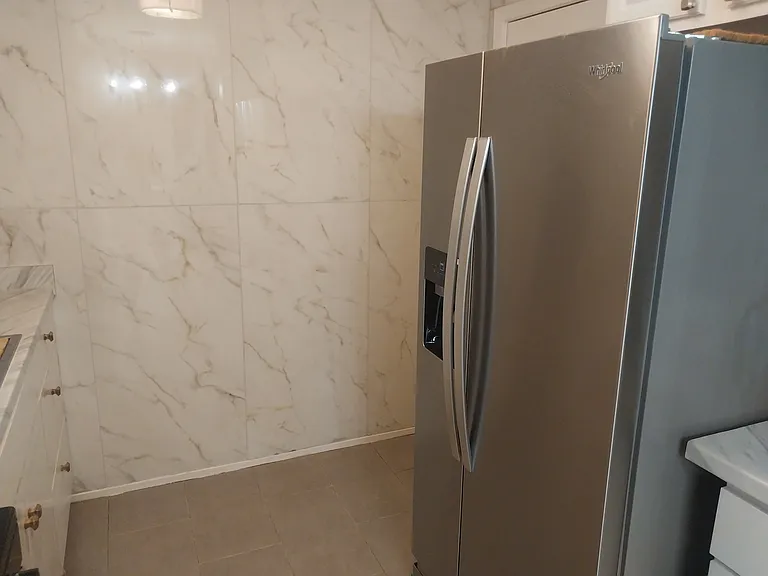 Kitchen with beautiful porcelain walls