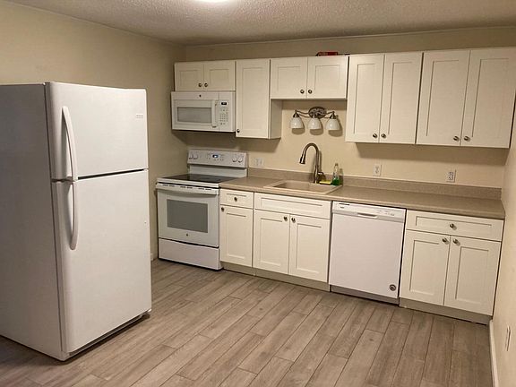 Kitchen. Light over sink. Soft close cabinets.