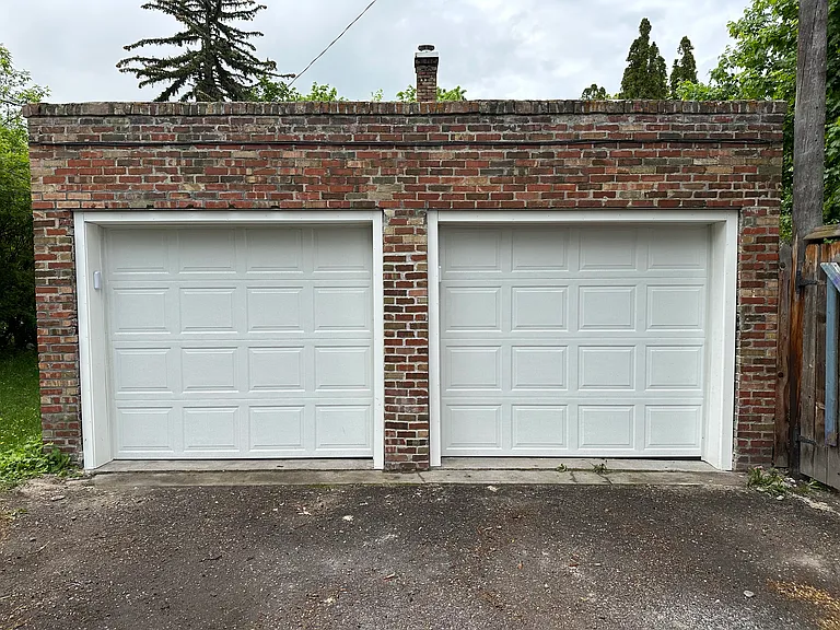Garage (right side) accessed from alley between Evans and Beckwith