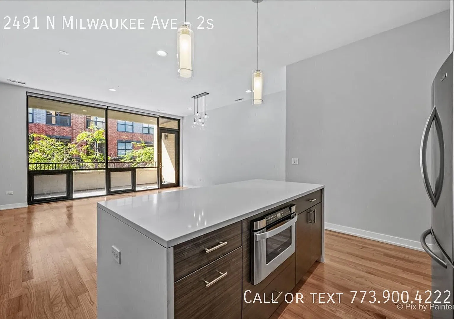Spacious 3 Bed, 2 Bath Logan Square Condo | Private Rooftop Deck, Elevator & Garage Parking Included — Photo 4