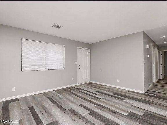 Living room area. Door picture is front door to the home.