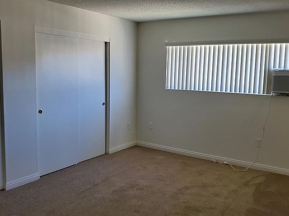 Master Bedroom w/A/C unit (New carpet & paint)