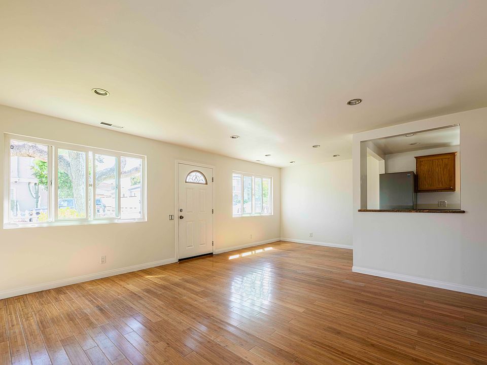 Living, Dining Rooms Looking At Entrance