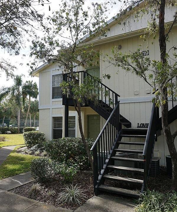 Front of building; unit is the upper one