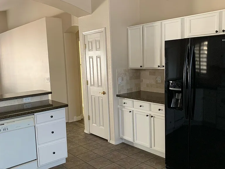 Large new refrigerator with icemaker and filtered water. Lots of cupboards and a separate pantry.