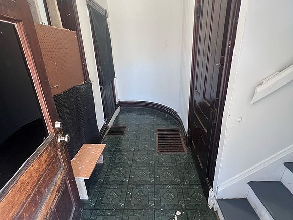 Mudroom with extra storage perfect for coats, bikes, or daily gear.