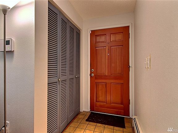 Inviting front entry and front hall closet. 