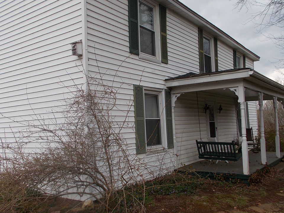 Front view with porch swing