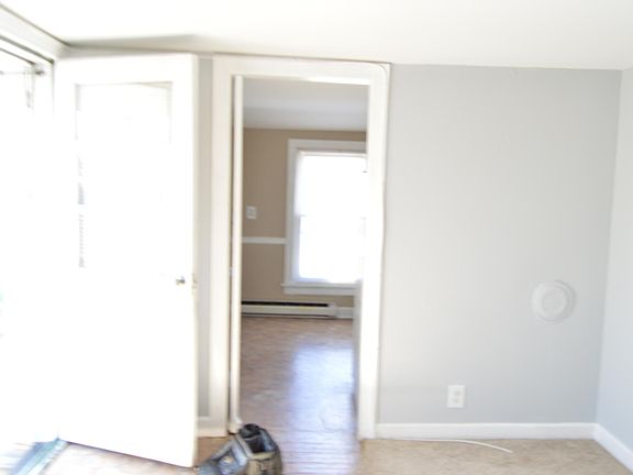 Living area looking into the kitchen