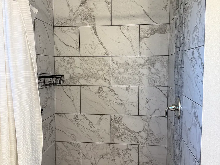 Large, marbled shower