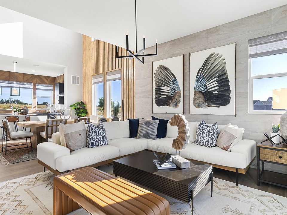 Experience luxury in Dillon Pointe s open space featuring elegant wood accents and high-end natural