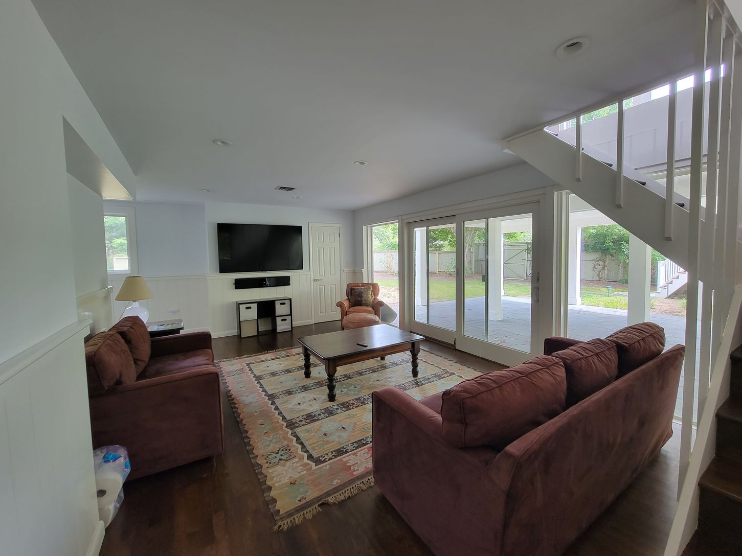  Lower level TV room with doors out to the large deck