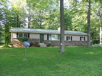 Notice the newer metal roof with a very extensive warranty.