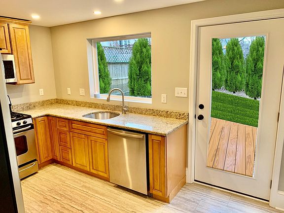 Kitchen w/ planned deck and landscaping