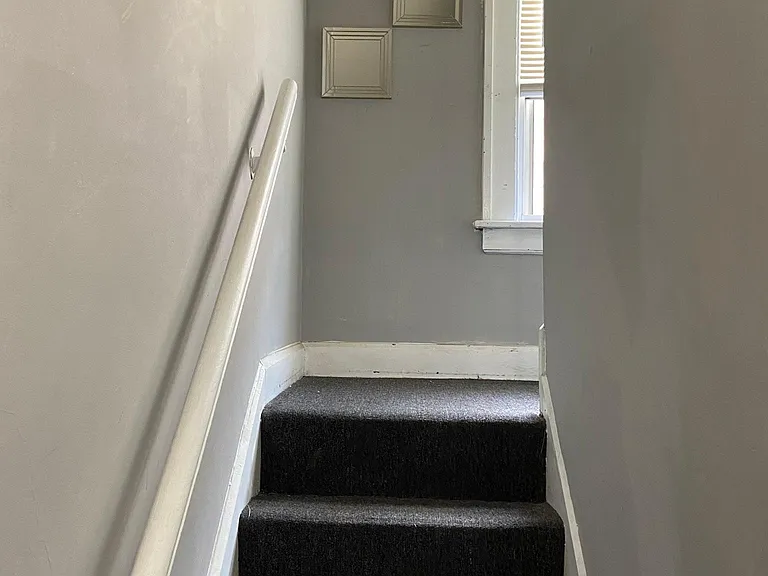 stairwell leading to 3'rd floor unit