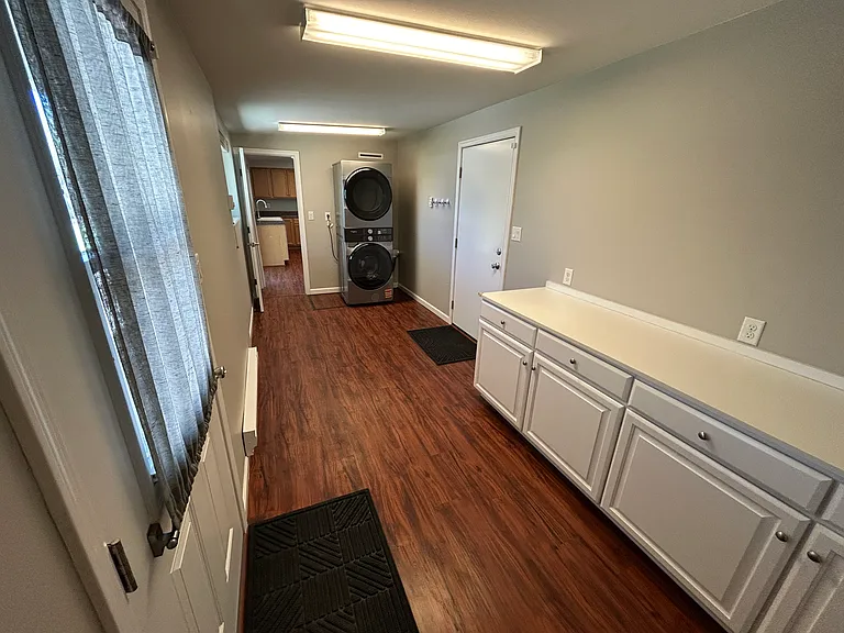 Laundry room/Mud room with direct access to carport and back yard