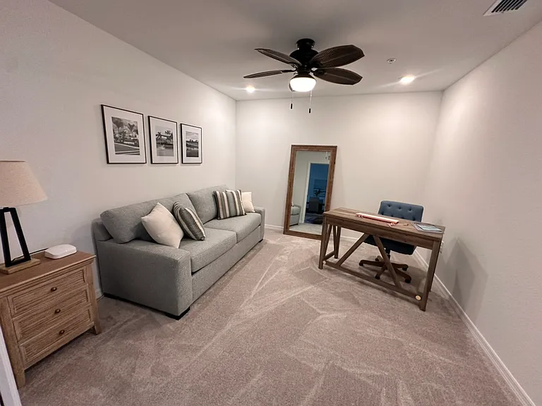 Den with desk and pull out sleeper sofa with upgraded mattress